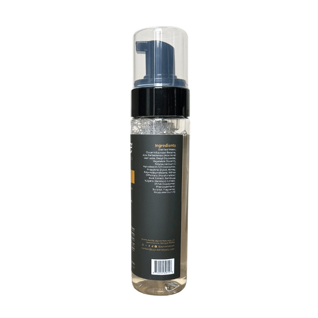 Set Me Firm Holding Mousse sideview, showing ingredients such as aloe vera, marshmallow root extract, and honey.