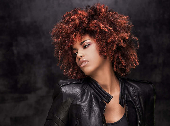 A woman with color-treated hair