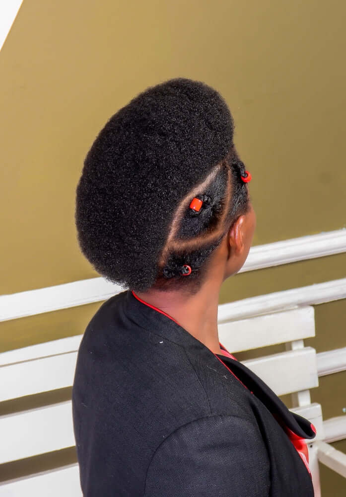 a woman with short 4c hair