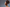 Side profile of woman with 4c hair in a bun