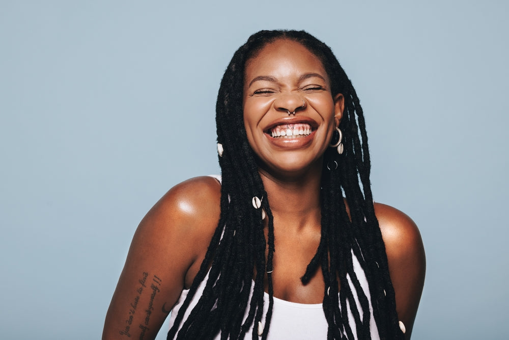 A woman with traditional locs