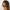 Side profile of a woman with braids