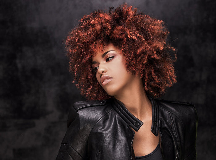 A woman with color-treated hair