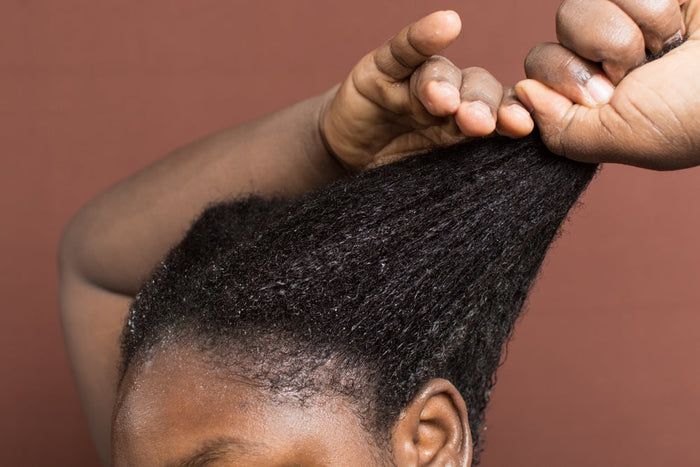 woman stretching her hair