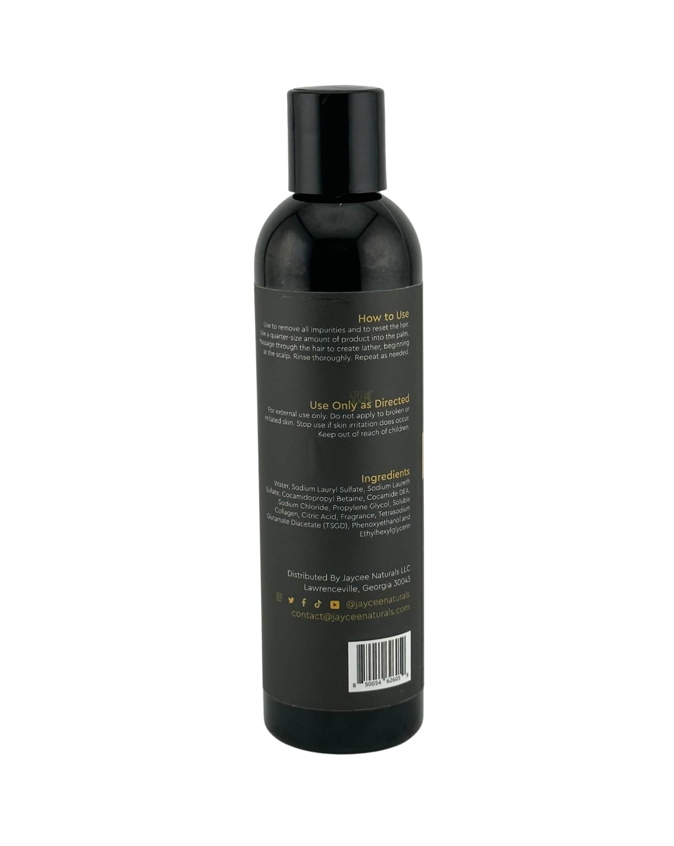 Jaycee Naturals Clarify Me Clarifying Shampoo. On the back of the bottle, we see instructions for use, ingredients, and warnings are visible on the label.