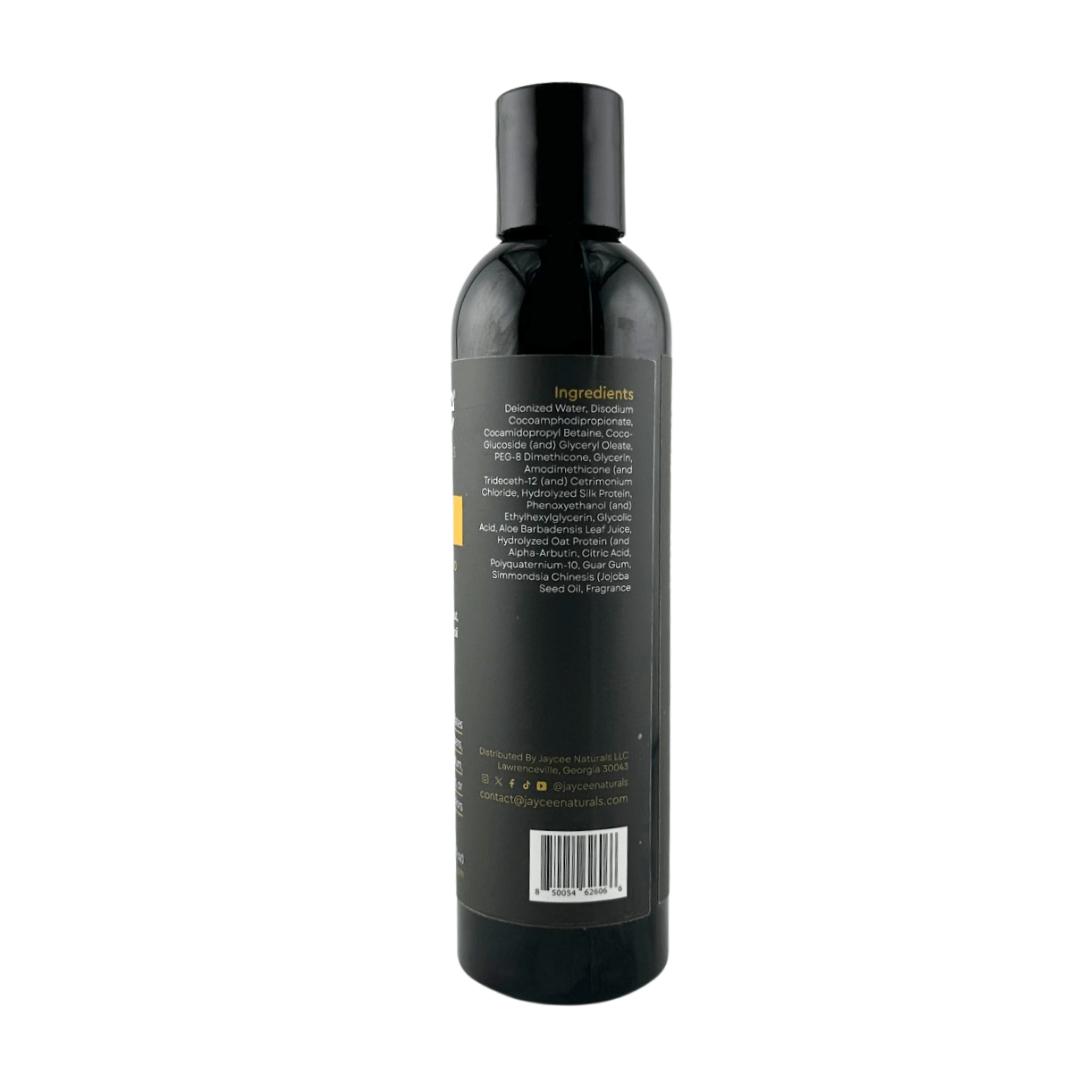 Jaycee Naturals Cleanse Me Moisturizing Shampoo, back view. The label lists ingredients, including water, hydrolyzed silk protein and jojoba seed oil.