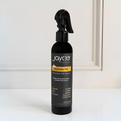 Jaycee Naturals Hydrate Me bottle on a white surface with a neutral background