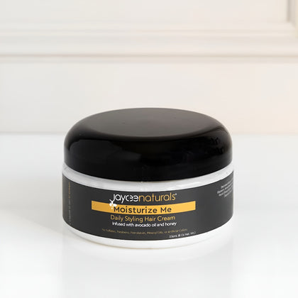 Jar of Jaycee Naturals Moisturize Me Daily Styling Hair Cream on a white background