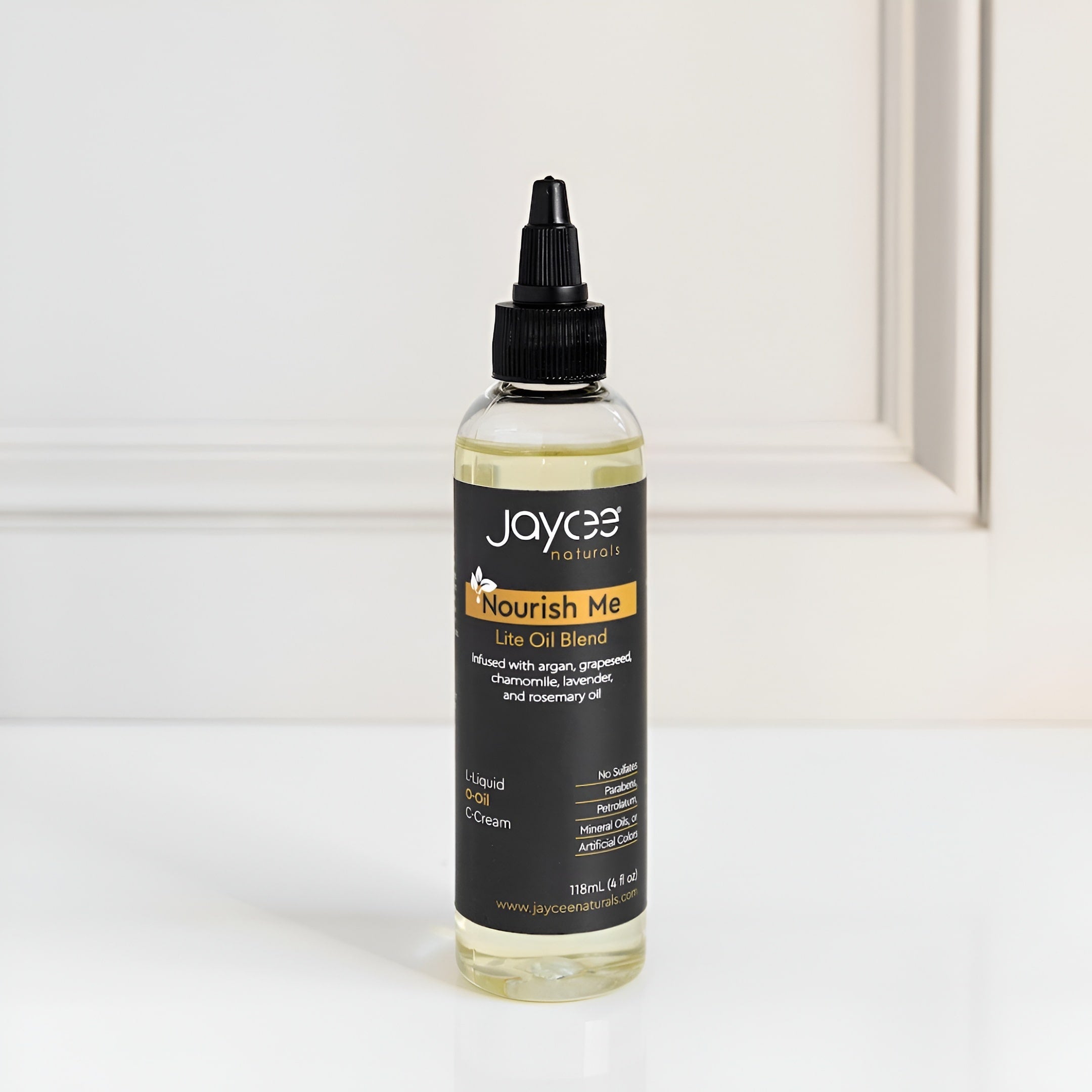 Bottle of Jaycee Naturals Nourish Me Lav Oil Blend on a white background