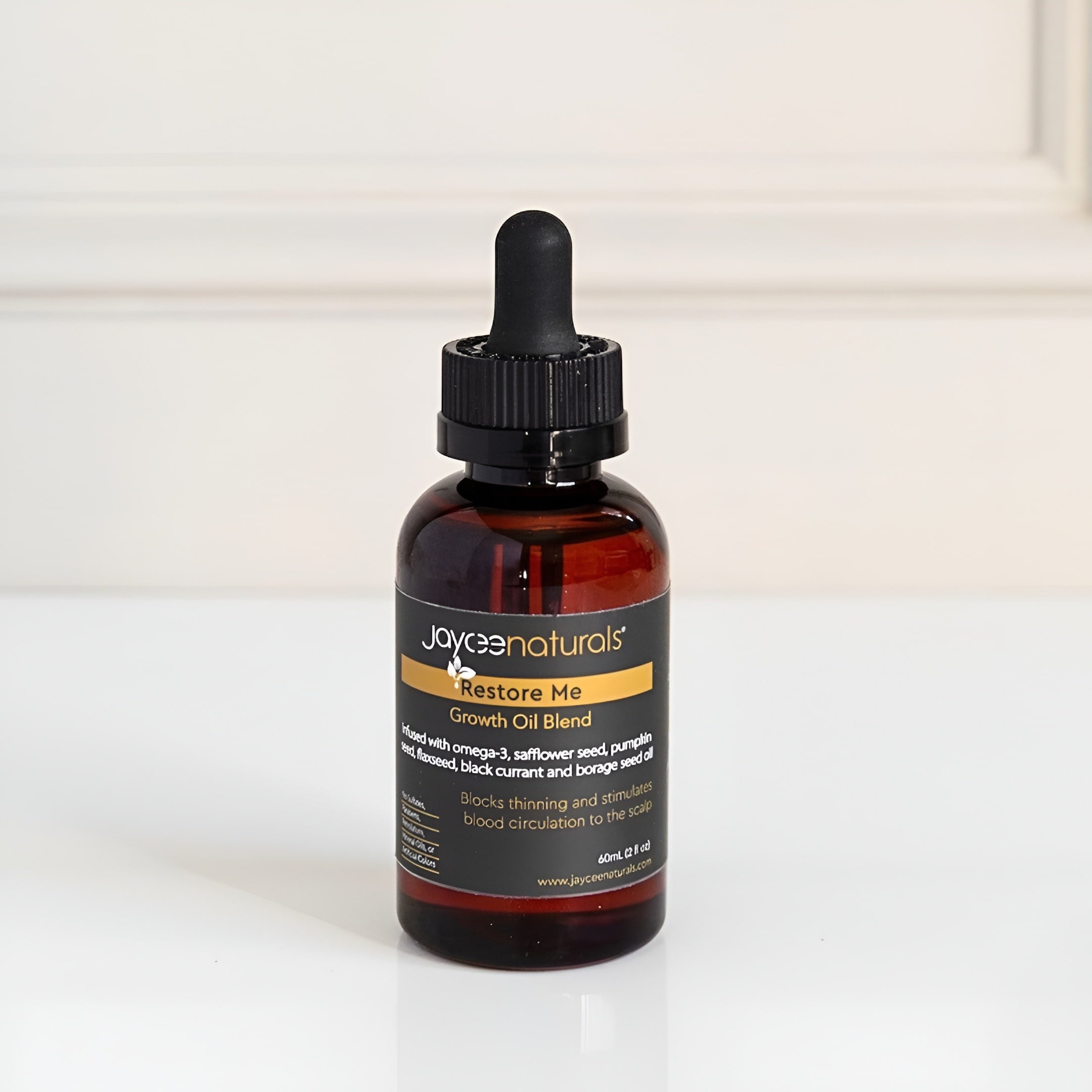 Bottle of Jayeenaturals Restore Me Growth Oil Blend on a white background