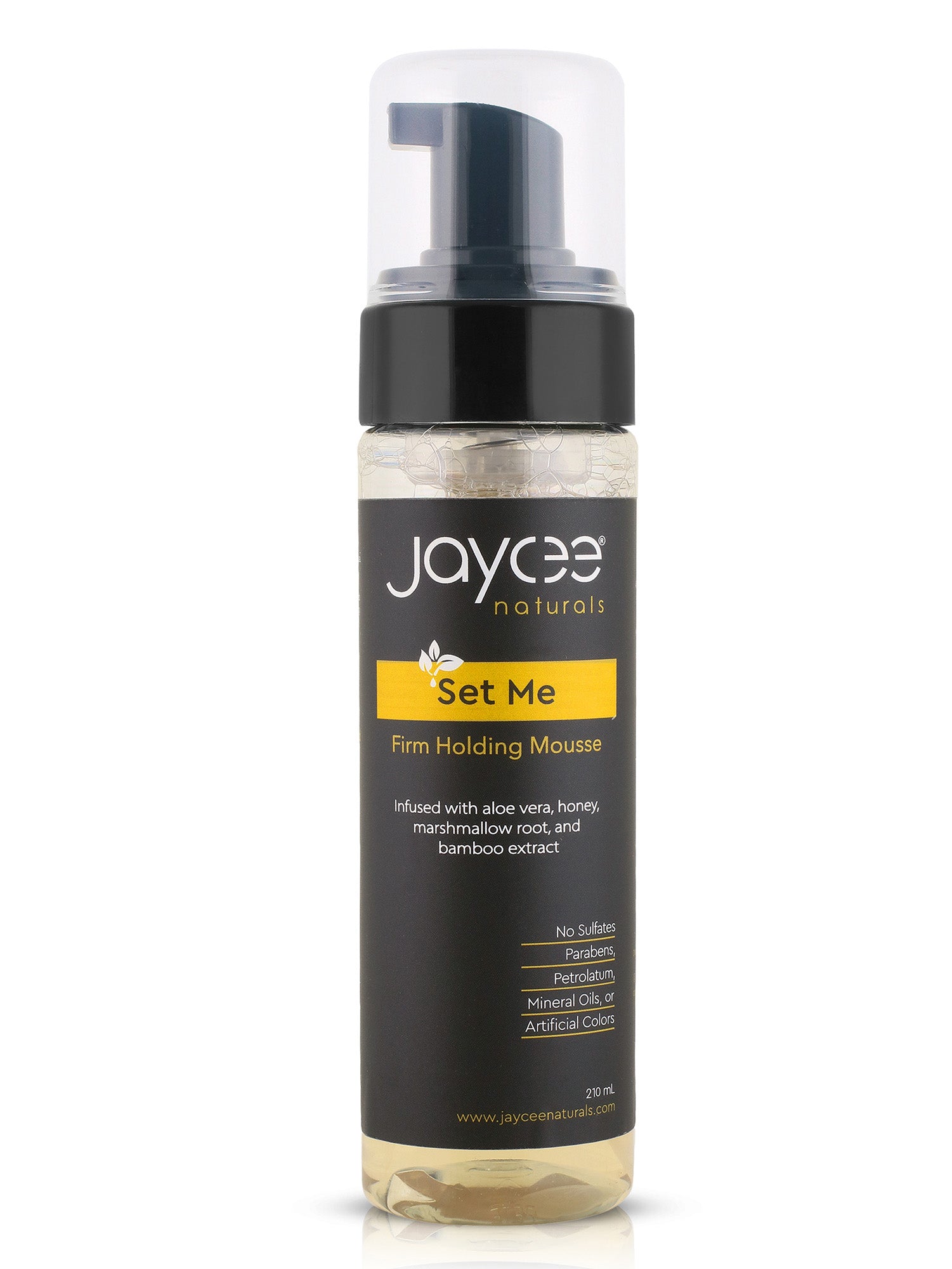 Jaycee Naturals Set Me Firm Holding Mousse bottle on a white background