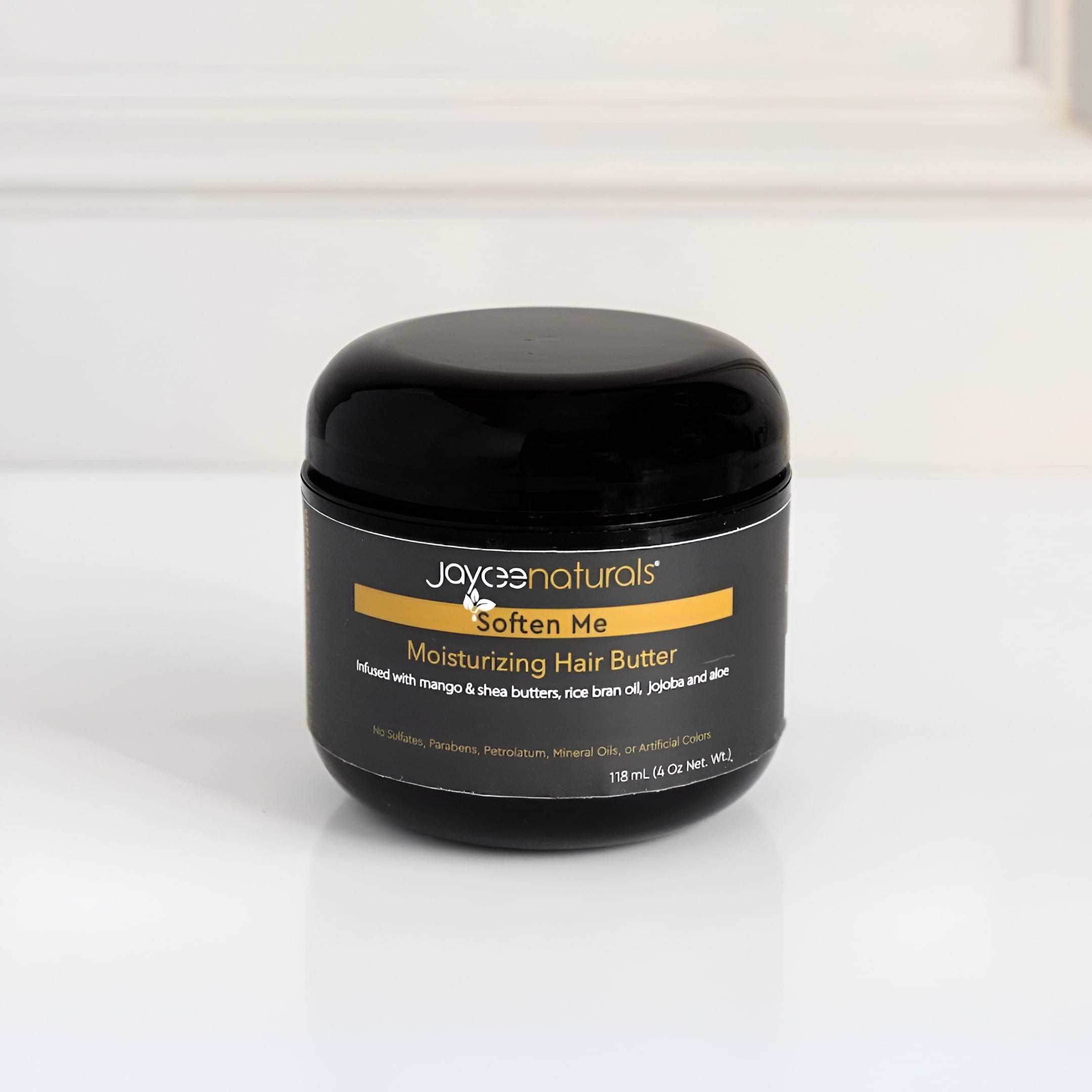 Jar of Jaycee Naturals moisturizing hair butter on a white background